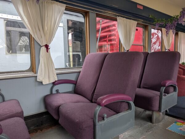 cooperstownandcharlottevalleyrailroad_santa-claus-express-lounge-seats-train-coach-purple-seat Cooperstownandcharlottevalleyrailroad Santa Claus Express Lounge Seats Train Coach Purple Seat