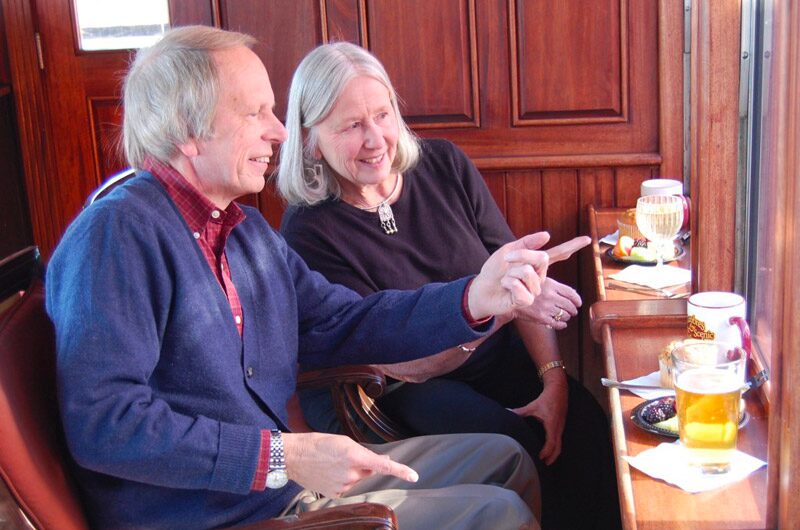 cumbrestoltec_all-aboard-chama-train-then-bus-coach-couple-train-window-drinks Cumbrestoltec All Aboard Chama Train Then Bus Coach Couple Train Window Drinks