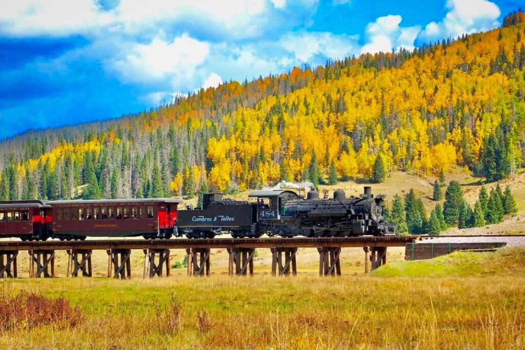 cumbrestoltec_all-aboard-chama-train-then-bus-coach-steam-train-bridge-autumn-forest Cumbrestoltec All Aboard Chama Train Then Bus Coach Steam Train Bridge Autumn Forest