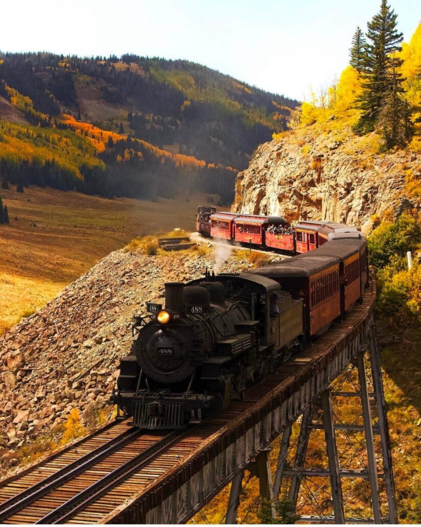 cumbrestoltec_all-aboard-chama-train-then-bus-coach-steam-train-bridge-autumn-mountains Cumbrestoltec All Aboard Chama Train Then Bus Coach Steam Train Bridge Autumn Mountains