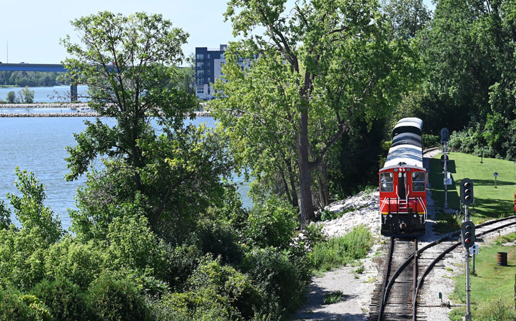 nationalrrmuseum_train-ride-train-lake-trees-signals Nationalrrmuseum Train Ride Train Lake Trees Signals