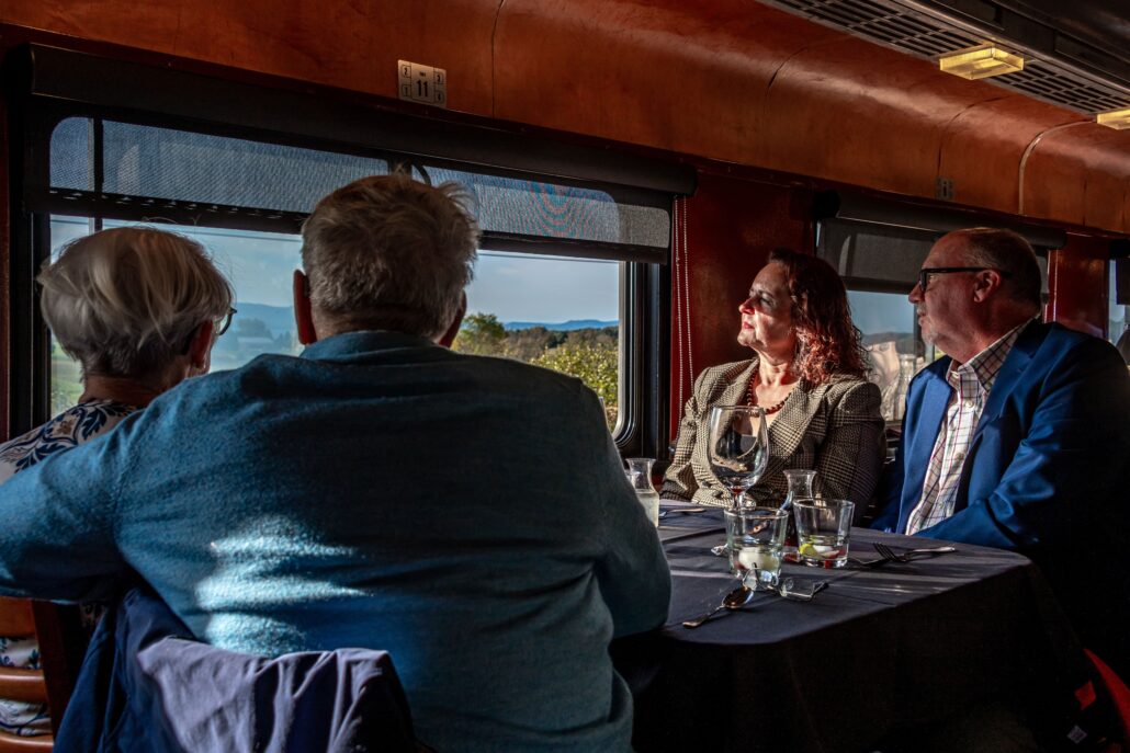 rails-vt_champlain-valley-dinner-train-dinner-train-passengers-window-view Rails Vt Champlain Valley Dinner Train Dinner Train Passengers Window View