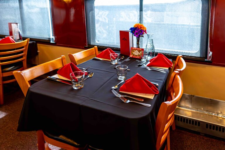 rails-vt_champlain-valley-dinner-train-dinner-train-table-red-napkins Rails Vt Champlain Valley Dinner Train Dinner Train Table Red Napkins