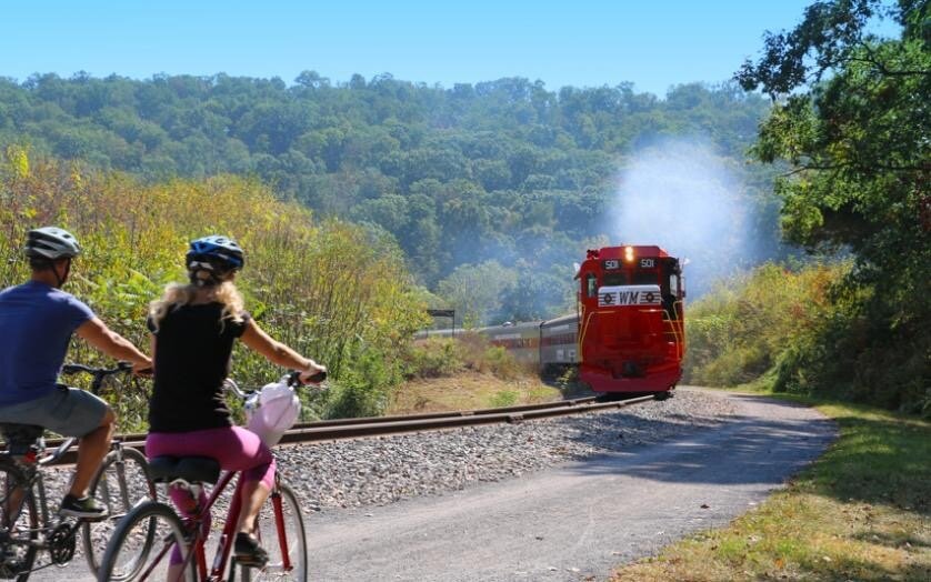 tracksandyaksllc_bike-train-bikers-red-train-rolling-hills Tracksandyaksllc Bike Train Bikers Red Train Rolling Hills