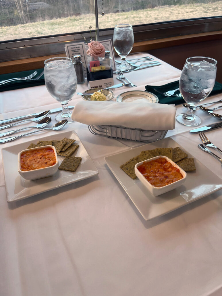 tvrail_new-year-s-eve-dinner-train-dining-table-soup-crackers-water Tvrail New Year S Eve Dinner Train Dining Table Soup Crackers Water